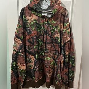 Chucky Men’s plus 3XL Graphic Hoodie with Green and Brown Camo.